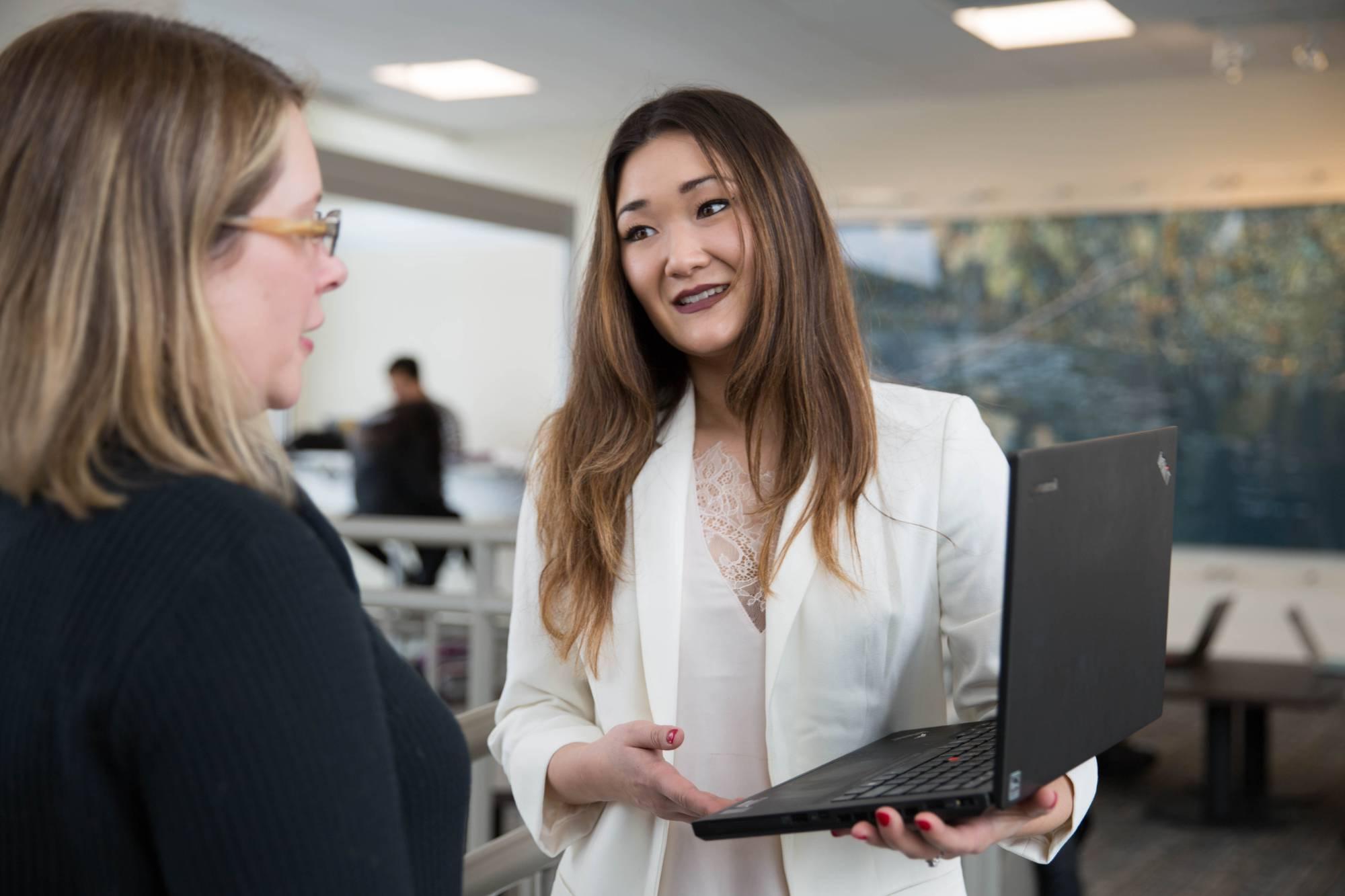 Graduate Faculty displaying computer screen